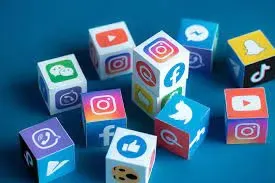 A bunch of cubes with different social media icons on them